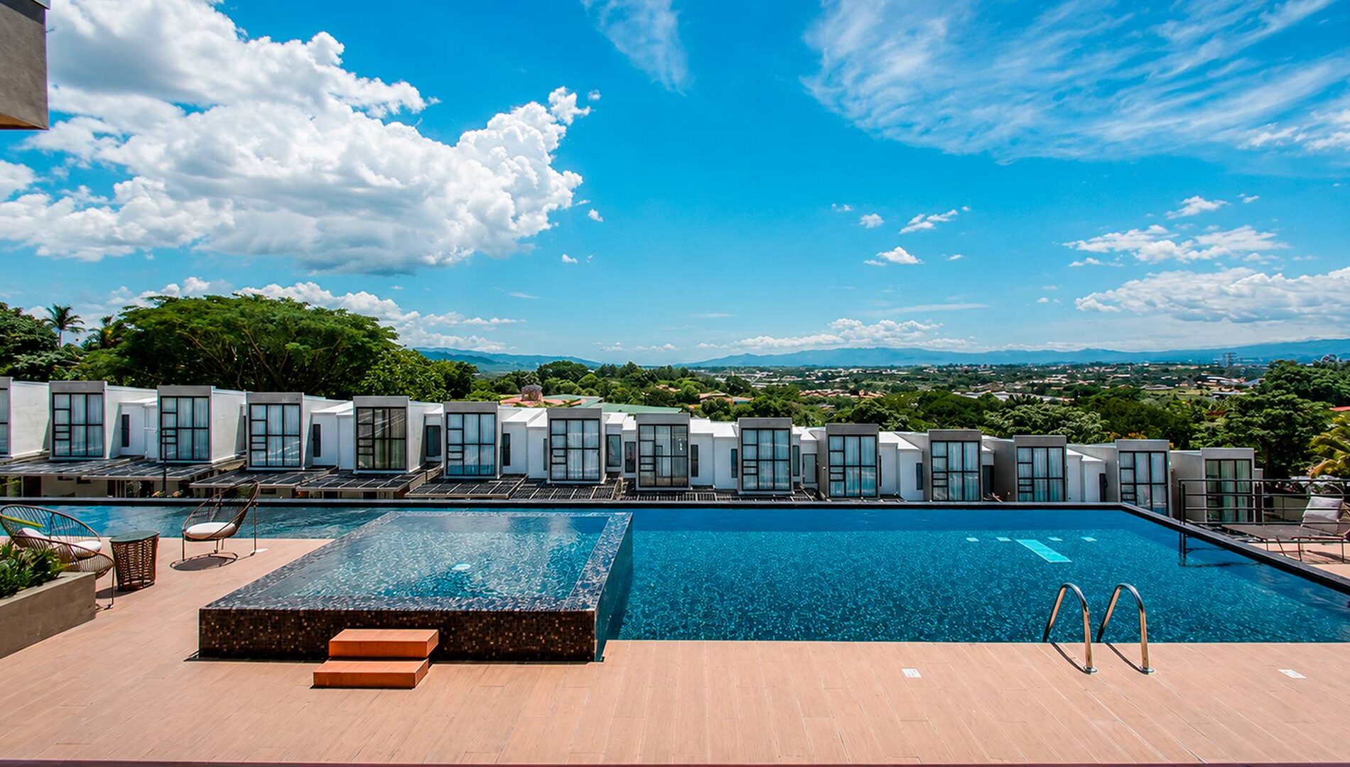 A terrace overlooking the San José skyline and the mountains of the Central Valley